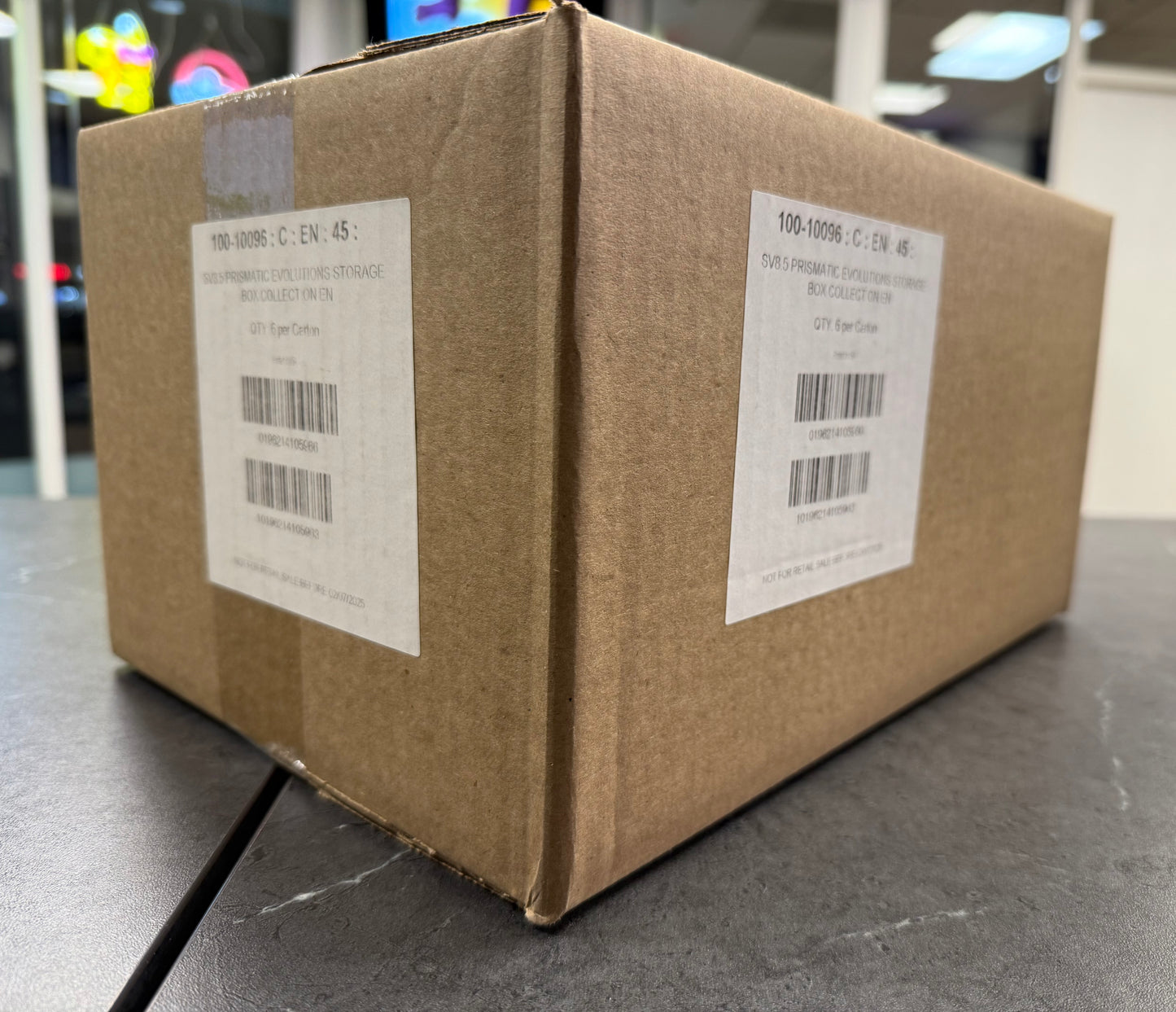 Prismatic Evolutions Surprise Box Case