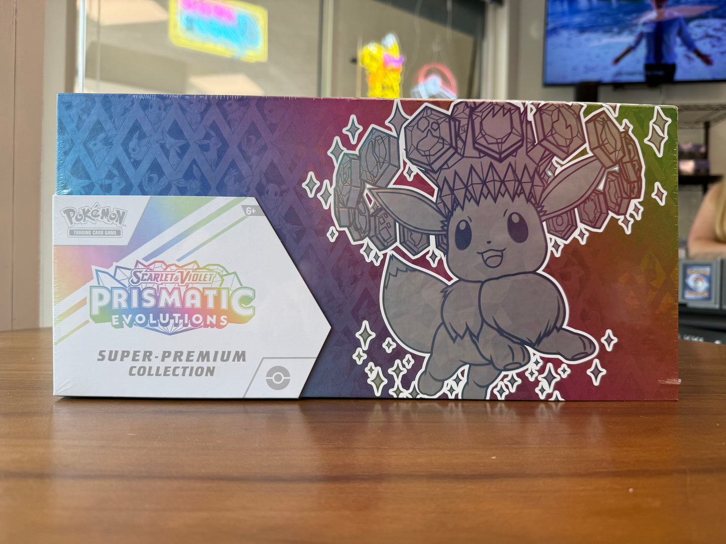 Prismatic Evolutions Super Premium Collection (SPC) (small tear, see pics)