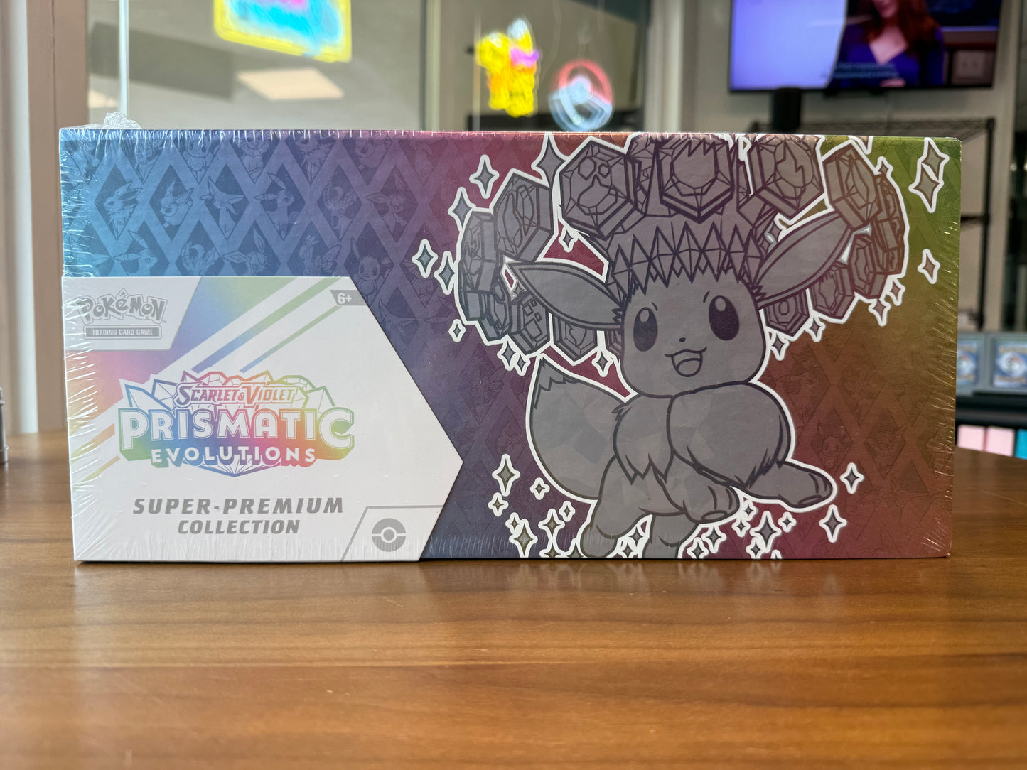 Prismatic Evolutions Super Premium Collection (SPC) (tear on bottom, see pics)